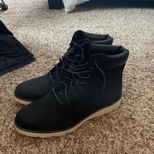Women’s timberland boots. Never worn. Size 9.5. $15